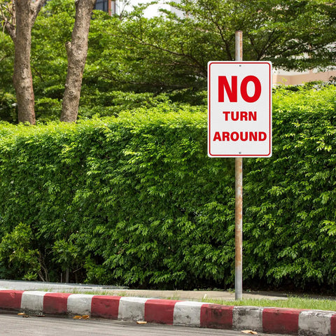 No Turn Around Sign Reflective Aluminum, Keeps Ya Seen In Darkness, Driveway Dead End Safety Marker, mounted on a pole near bushes.