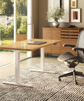 Top Notch Solid White Oak Electric Standing Desk With Dual Motor Height Adjustable System And Built Tough Steel Base For Easy Home Office Or Chill Creative Workspace Setup in a modern room.