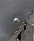 Close-up of a threaded hole in metal, showing the result of using the 4-40 NC Pro Grade Machine Screw Tap And 43 Wire Gauge High Speed Steel Drill Bit Set.