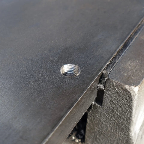 Close-up of a threaded hole in metal, showing the result of using the 4-40 NC Pro Grade Machine Screw Tap And 43 Wire Gauge High Speed Steel Drill Bit Set.