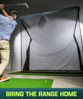 Golfer using Elite Golf Net With LoftGuard Canopy And Steel Frame 8 By 8 Foot Practice Hitting Net For Indoor And Outdoor Use