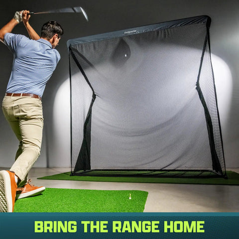 Golfer using Elite Golf Net With LoftGuard Canopy And Steel Frame 8 By 8 Foot Practice Hitting Net For Indoor And Outdoor Use