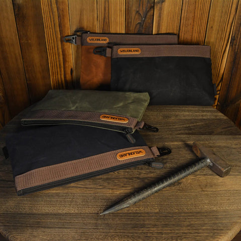 Four Pack 12 Inch Waxed Canvas Tool Pouches With Zippers Heavy Duty Waterproof Outdoor Tool Bags Set on wooden table