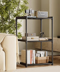Kick Dust Bunnies Out The Door With This Solid 3 Tier Metal Storage Shelf, black rack with three levels, 17.3x12.8x28.9 inches.