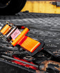 Beefy Heavy Duty Car Tie Down Straps 2 Inch Wide By 96 Inch Long 2 Pack With Twisted Snap Hooks on metal surface