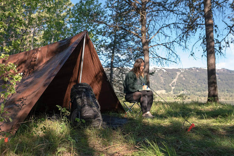 Rip Stop Tarp 8 By 10 Feet Heavy Duty Waterproof Brown Outdoor Shelter For Camping And Backyard Use in forest setting