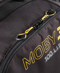 Close-up of Moby 3 100L Large Capacity Roller Luggage Bag With Backpack Straps, showing zip and logo detail.