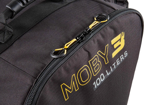 Close-up of Moby 3 100L Large Capacity Roller Luggage Bag With Backpack Straps, showing zip and logo detail.