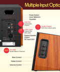 Back panel inputs and controls on Powered Bookshelf Speakers With Bluetooth, 80W RMS, Bass Reflex Natural Wood Cabinet.