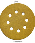 Close-up of Dustless Sanding Discs Set 50 Pcs 5 Inch 8 Hole Round Sandpaper, highlighting hole and size measurements.