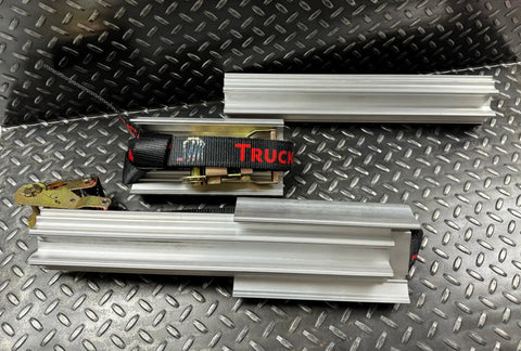 Emergency Tire Traction Aid With Extender Bars For Light Trucks To Medium Commercial Vehicles on metal surface