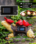 Cardinal Garden Statue With Solar Lights Outdoor Memorial Figurine on log showing solar panel and LED lights in garden setting