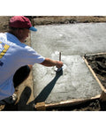 Person using Mini Trowel For Finishing Concrete 8 Inch By 3 Inch Carbon Steel Blade With Lightweight Aluminum Xtralite Mounting on fresh slab