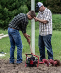 Two men using Beefy Dual Person Auger Powerhead With 52cc 2 Cycle Viper Engine Fits 2 Inch To 10 Inch Auger Bits Dual Handlebars