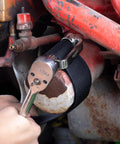 Oil Filter Strap Wrench 27 Inch Heavy Duty Nylon Tool For Oversized Filters Over 8 Inches Dual Drive Compatible With 3/8 And 1/2 Inch Drive Tools No Slip Grip For Stubborn Filters in use on engine oil filter