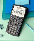Legit Game Changing Scientific Calculator Featuring Two Line Display Advanced Statistics And Quick Fraction Conversions on desk.