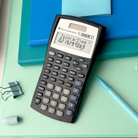 Legit Game Changing Scientific Calculator Featuring Two Line Display Advanced Statistics And Quick Fraction Conversions on desk.