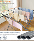 Heavy Duty Indoor Clothes Drying Rack With Twelve Solid Horizontal Rods And Tight Grip Sock Clips Efficiently Air Dries full loads with wide spacing.