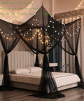 Black Bed Canopy With Mosquito Net for Full Queen and King Size Beds, indoor setting, modern Gothic Halloween decor.