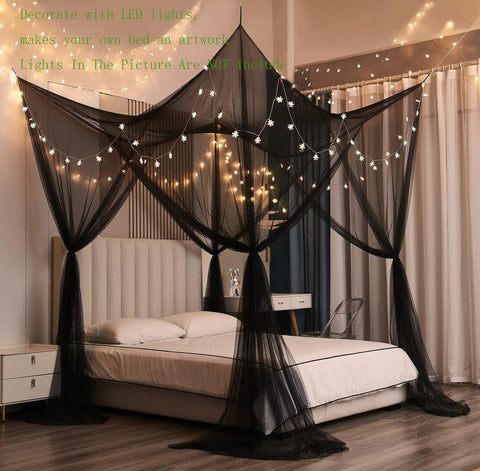 Black Bed Canopy With Mosquito Net for Full Queen and King Size Beds, indoor setting, modern Gothic Halloween decor.