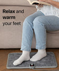 Person using Foot Friendly Tap To Activate Heated Floor Mat For Electric Underfoot Warmer That Heats Quietly Up To 150 Degrees Fahrenheit Energy Efficient Floor Heat For Cozy Feet And Quick Room Warmth