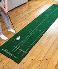 Person practicing on Big Time Golf Putting Mat For Home Practice 367cm By 67cm With Five Independent Targets Alignment Lines Foot Markings