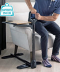 Person demonstrating Adjustable Bamboo Tray Table With Ergonomic Safety Handle And Stand For Couch Or Lap, supports 250 lbs