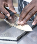 Using the All In One Pro Grade Diamond Sharpening Kit with 180 600 and 300 1000 grit diamond stones to sharpen a kitchen knife.