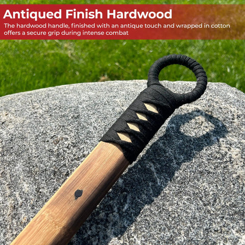 Cotton wrapped grip of Beefy 53 Inch Chinese Podao Halberd Polearm With Hand Forged High Carbon Steel Blade on stone surface.