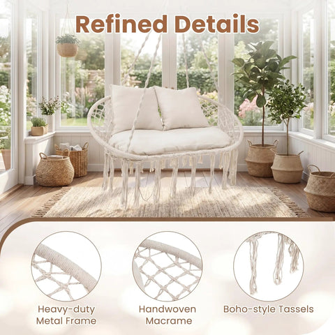Double Hammock Chair With Cushions For Indoor And Outdoor Hangouts Boho Macrame Swing Seat That Fits Two People with tassels shown in a sunroom