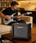 Musician playing guitar with 20W Electric Guitar Amplifier With Carry Handle For Practice And Small Gigs clean and distortion channels