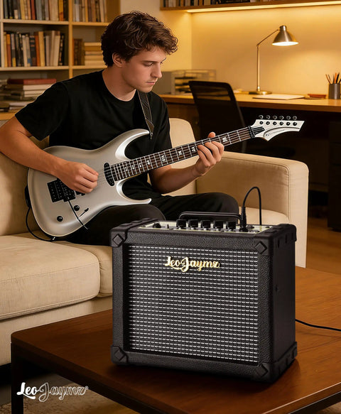 Musician playing guitar with 20W Electric Guitar Amplifier With Carry Handle For Practice And Small Gigs clean and distortion channels