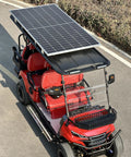 Premium 4 Plus 2 Seater Electric Golf Cart Featuring 48V Lithium Battery And Integrated Solar Panel, red design with solar roof.