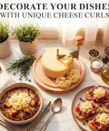 Rose Shaped Cheese Cutter Shaver For Semi Hard Cheeses, Manual Rotating Wheel Tool With Stainless Steel Blade And Non Slip Wood Base displayed on charcuterie board.