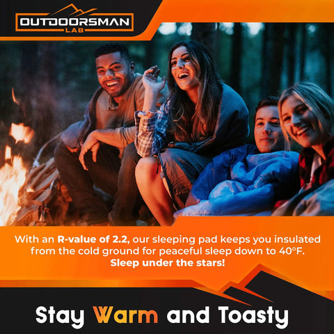 Group of friends camping by a fire using Ultra Lightweight Camping Sleeping Pad No More Back Pain With 5cm Thick Inflatable Mat.
