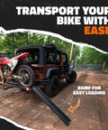 Anti-Tilt Motorcycle Hitch Carrier With 73 Inch Ramp And 47 Inch Dirt Bike Loading Ramp For Fat Tire E-Bikes Fits 2 Inch Receivers Weatherproof Heavy Duty Steel installed on SUV with dirt bike
