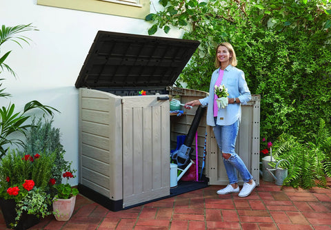 All Weather Heavy Duty Outdoor Storage Shed Made From Resin Plastic For Forty Two Cubic Feet Of Easy Patio Garden Tool Organization In Earthy Brown Shade with open lid.