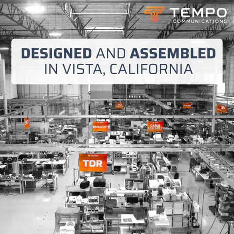 Factory floor with signage "Designed and Assembled in Vista, California," showcasing cable assembly and TDR stations.