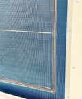 Close-up of the cooling fins of a Heavy-Duty 61000 BTU Industrial Air Conditioner for Garages And Warehouses.