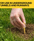 Person placing poison moleworm into soil for Poison Moleworms Kit For Outdoors With 10 Realistic Moleworms And 5 Tunnel Locator Flags