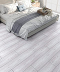 Bedroom with Coastal White Wood Grain Peel And Stick Vinyl Flooring Planks 6x36 In Waterproof Self Adhesive Floor Tiles.