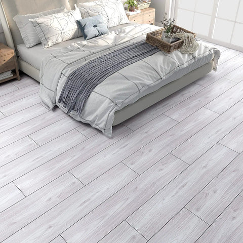 Bedroom with Coastal White Wood Grain Peel And Stick Vinyl Flooring Planks 6x36 In Waterproof Self Adhesive Floor Tiles.