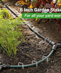 200 Pack Landscape Staples Garden Stakes 6 Inch 11 Gauge Galvanized Ground Pins securing irrigation tubing in garden