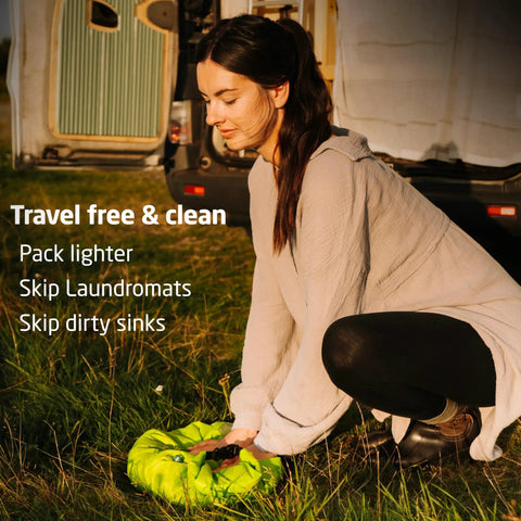 Heavy Duty Travel Laundry Sack Featuring Slick Inner Washboard Grooves Keeps Your Everyday Threads Fresh Camping Trips RV Adventures And Hotel Stays in use outdoors.