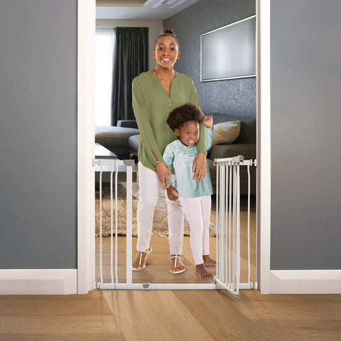 Walk Through Baby Safety Gate With Stay Open Feature Kid Safe For Busy Homes Pressure Mounted Double Locking Latch One Handed Operation Fits 29.5 To 39 Inches Model CK037 in doorway with family