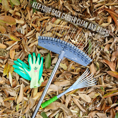 Adjustable 17 To 63 Inch Thatch Rake With 24 Steel Tines on leaves with gardening gloves, ideal for yard maintenance.
