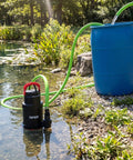 Heavy Duty Submersible Water Pump With 4600 GPH Flow Rate And Built In Filter Base for pond draining, black pump in water
