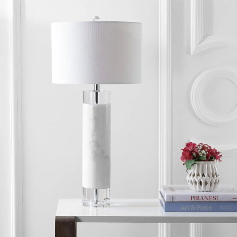 32 Inch White Marble And Crystal LED Table Lamp With Linen Shade on a desk next to books and a vase, for living room or bedroom.