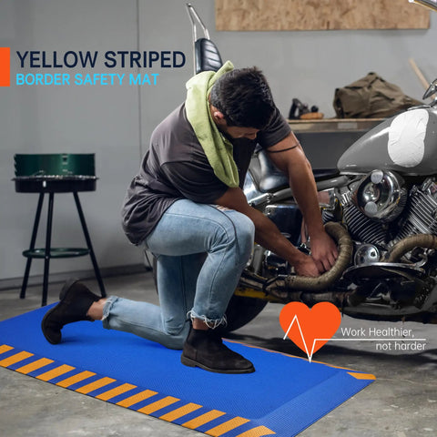 Top Shelf Anti Fatigue Standing Floor Mat Engineered From Dense Memory Foam For Shops And Home Desks Delivering Heavy Duty Comfort To Ease Persistent Leg And Back Soreness During Every Grueling Shift In Navy With Yellow Trim