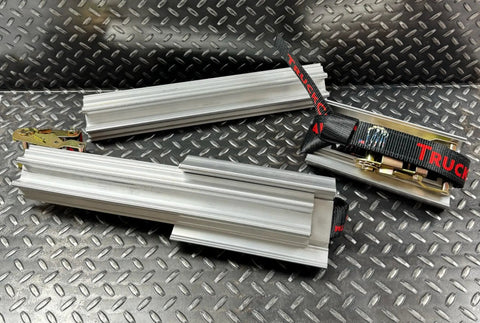 Emergency Tire Traction Aid With Extender Bars For Light Trucks To Medium Commercial Vehicles on diamond plate surface